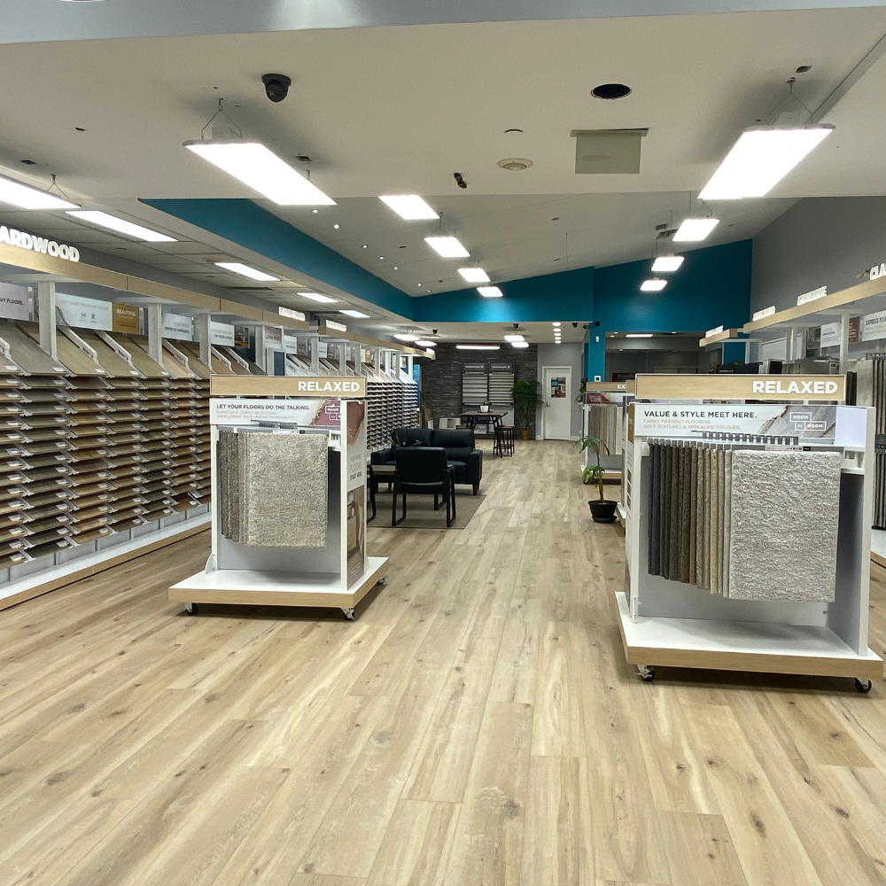 Designers Carpet One flooring showroom hosting food bank drop off donations