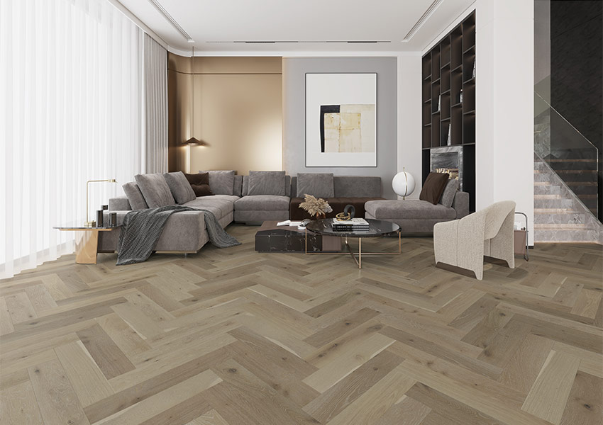 herringbone hardwood flooring installation in living room 